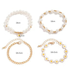 Load image into Gallery viewer, Ensemble de 4 Bracelets Plaqué Or avec Perles et Fleurs – Tendance Printanière