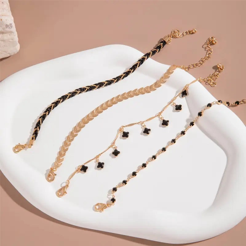 Ensemble de Bracelets Plaqué Or et Noirs – Élégance et Raffinement
