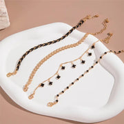 Ensemble de Bracelets Plaqué Or et Noirs – Élégance et Raffinement