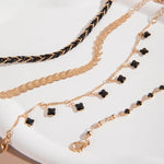 Load image into Gallery viewer, Ensemble de Bracelets Plaqué Or et Noirs – Élégance et Raffinement
