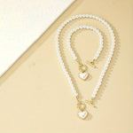 Load image into Gallery viewer, Ensemble Collier et Bracelet de Perles avec Pendentifs Cœur - Romantique et Chic
