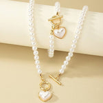 Load image into Gallery viewer, Ensemble Collier et Bracelet de Perles avec Pendentifs Cœur - Romantique et Chic
