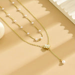 Load image into Gallery viewer, Collier Délicat à Double Chaîne avec Perles et Pendentif Fleur - Grâce et Féminité
