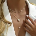 Load image into Gallery viewer, Collier Délicat à Double Chaîne avec Perles et Pendentif Fleur - Grâce et Féminité
