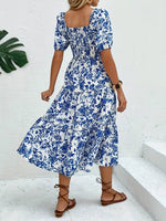 Load image into Gallery viewer, Robe Midi à Motif Floral Bleu - L&#39;Essence de l&#39;Élégance Estivale
