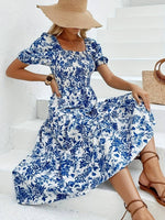 Load image into Gallery viewer, Robe Midi à Motif Floral Bleu - L&#39;Essence de l&#39;Élégance Estivale
