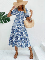 Load image into Gallery viewer, Robe Midi à Motif Floral Bleu - L&#39;Essence de l&#39;Élégance Estivale
