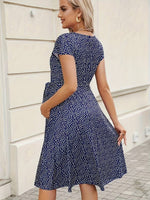 Load image into Gallery viewer, Robe de Grossesse à Pois bleue , Confort et Élégance

